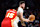 PORTLAND, OREGON - JANUARY 03: Jusuf Nurkic #27 of the Portland Trail Blazers handles the ball against Clint Capela #15 of the Atlanta Hawks during the first quarter at Moda Center on January 03, 2022 in Portland, Oregon. NOTE TO USER: User expressly acknowledges and agrees that, by downloading and or using this photograph, User is consenting to the terms and conditions of the Getty Images License Agreement. (Photo by Abbie Parr/Getty Images)