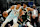 MILWAUKEE, WISCONSIN - JANUARY 08: Giannis Antetokounmpo #34 of the Milwaukee Bucks defends Victor Wembanyama #1 of the San Antonio Spurs during the second quarter at Fiserv Forum on January 08, 2025 in Milwaukee, Wisconsin. NOTE TO USER: User expressly acknowledges and agrees that, by downloading and or using this photograph, User is consenting to the terms and conditions of the Getty Images License Agreement. (Photo by Patrick McDermott/Getty Images)