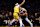 LOS ANGELES, CALIFORNIA - JANUARY 17: Luka Doncic #77 of the Dallas Mavericks drives to the basket against Anthony Davis #3 of the Los Angeles Lakers during the third quarter at Crypto.com Arena on January 17, 2024 in Los Angeles, California. NOTE TO USER: User expressly acknowledges and agrees that, by downloading and or using this photograph, User is consenting to the terms and conditions of the Getty Images License Agreement. (Photo by Katelyn Mulcahy/Getty Images)