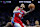 PHILADELPHIA, PENNSYLVANIA - JANUARY 10: Caleb Martin #16 of the Philadelphia 76ers shoots the ball against Yves Missi #21 and Dejounte Murray #5 of the New Orleans Pelicans at the Wells Fargo Center on January 10, 2025 in Philadelphia, Pennsylvania. The Pelicans defeated the 76ers 123-115. NOTE TO USER: User expressly acknowledges and agrees that, by downloading and/or using this photograph, user is consenting to the terms and conditions of the Getty Images License Agreement. (Photo by Mitchell Leff/Getty Images)