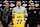 Slovenian basketball player Luka Doncic (C) holds up a jersey as he stands with Los Angeles Laker's head coach JJ Redick (R) and Los Angeles Laker's General Manager Rob Pelinka during a press conference that introduced Doncic as the latest member of Los Angeles Lakers , At UCLA Health Training Center in El Segundo, California on February 4, 2025. Said Slovenian star Luka Doncic February 2, 2025 He thought he would spend his entire NBA career in Dallas and thank fans in Texas for getting it To feel like home a day after Mavericks suddenly traded him to Los Angeles Lakers. (Photo by Patrick T. Fallon / AFP) (Photo by Patrick T. Fallon / AFP via Getty Images)          