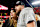 KANSAS CITY, MISSOURI - JANUARY 26: Tight end Travis Kelce #87 of the Kansas City Chiefs celebrates with Taylor Swift on the field after the AFC Championship game against the Buffalo Bills, at GEHA Field at Arrowhead Stadium on January 26, 2025 in Kansas City, Missouri. (Photo by Brooke Sutton/Getty Images)