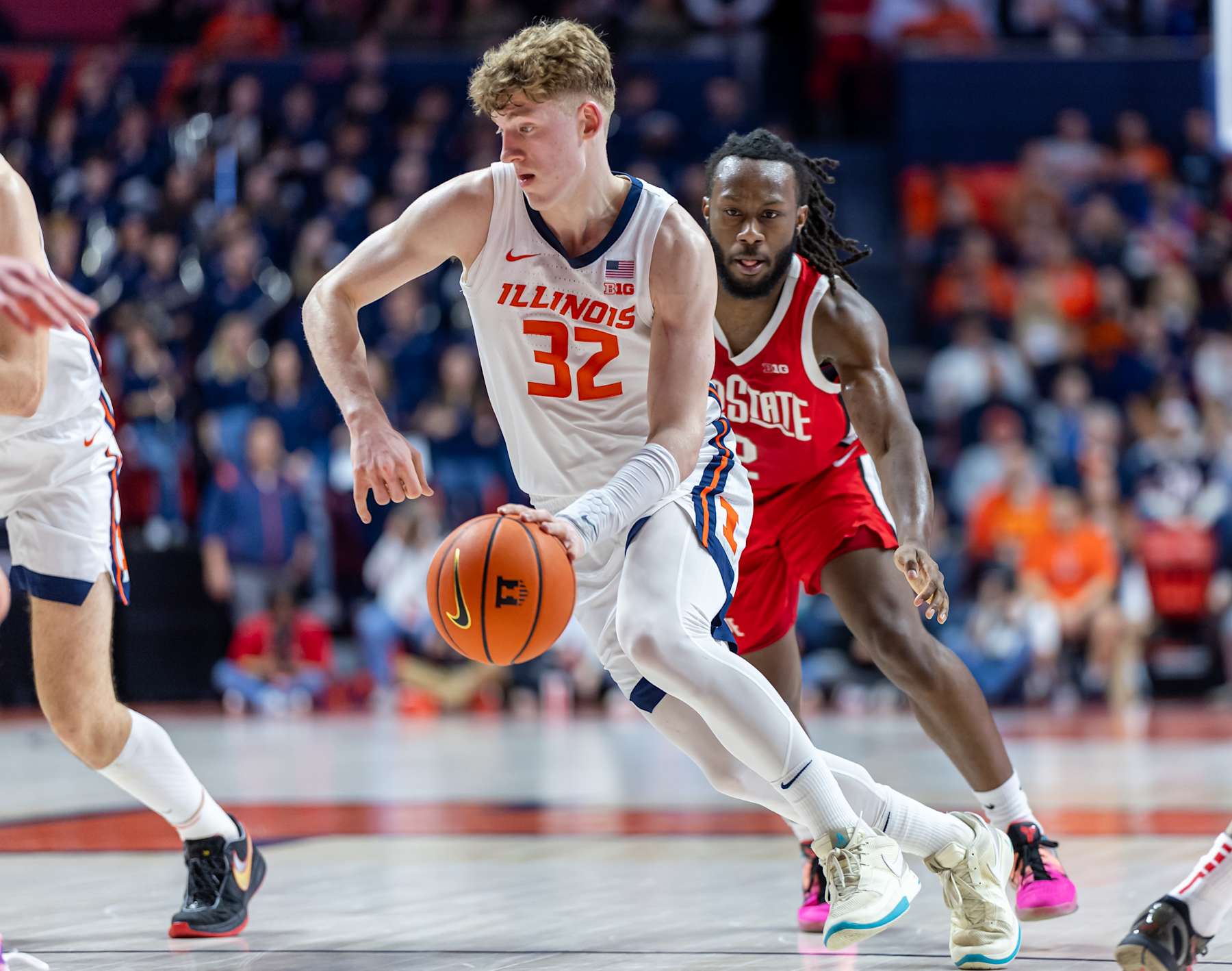 basketball CHAMPAIGN, ILLINOIS - FEBRUARY 2: Kasparas Jakucionis #32 of the Illinois Fighting Illini brings the ball up court during the game against the Ohio State Buckeyes at State Farm Center on February 2, 2025 in Champaign, Illinois.  (Photo by Michael Hickey/Getty Images)