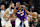 PHOENIX, ARIZONA - JANUARY 12: Kevin Durant #35 of the Phoenix Suns handles the ball under pressure from Cody Martin #11 of the Charlotte Hornets during the second half of the NBA game at Footprint Center on January 12, 2025 in Phoenix, Arizona. NOTE TO USER: User expressly acknowledges and agrees that, by downloading and or using this photograph, User is consenting to the terms and conditions of the Getty Images License Agreement. (Photo by Christian Petersen/Getty Images)