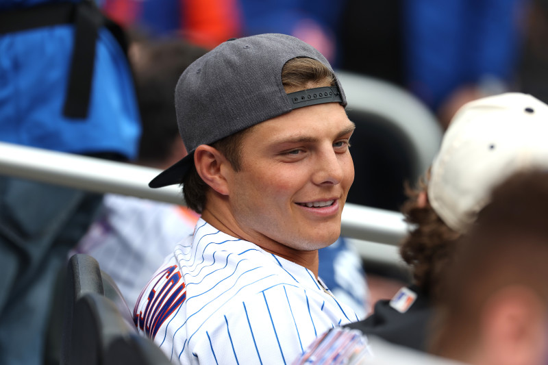 NEW YORK, NEW YORK - MAY 19: Zach Wilson, Quarterback for the New York Jets watches the game between the New York Mets against the St. Louis Cardinals during their game at Citi Field on May 19, 2022 in New York City. (Photo by Al Bello/Getty Images)