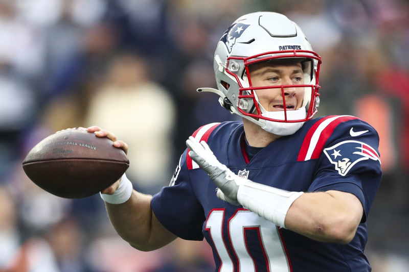 December 18, 2021: New England Patriots quarterback Mac Jones (10) passes  the ball during NFL football game action between the New England Patriots  and the Indianapolis Colts at Lucas Oil Stadium in