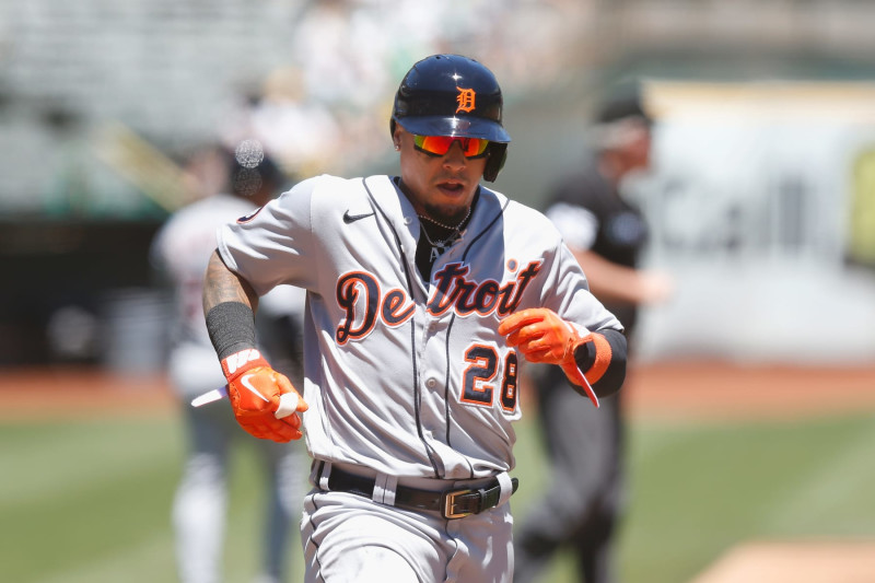 OAKLAND, CALIFORNIA - JULY 21: Javier Baez #28 of the Detroit Tigers crosses home plate to score on a double by Robbie Grossman in the top of the third inning during game one of a doubleheader at RingCentral Coliseum on July 21, 2022 in Oakland, California. (Photo by Lachlan Cunningham/Getty Images)
