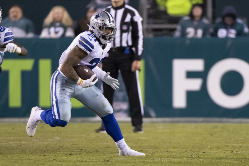 Dallas Cowboys running back Ezekiel Elliott (21) stands on stands against  the Denver Broncos in the first half of an NFL football game Sunday, Aug  13, 2022, in Denver. (AP Photo/Bart Young