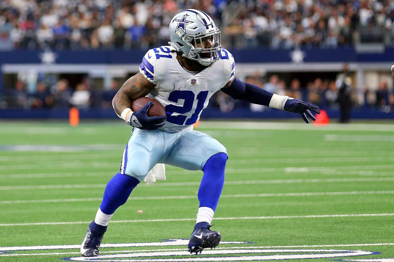 Dallas Cowboys running back Ezekiel Elliott (21) stands on stands against  the Denver Broncos in the first half of an NFL football game Saturday, Aug  13, 2022, in Denver. (AP Photo/Bart Young