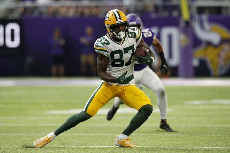 MINNEAPOLIS, MN - SEPTEMBER 11: Green Bay Packers quarterback Aaron Rodgers  (12) looks to pass during an NFL game between the Minnesota Vikings and  Green Bay Packers on September 11, 2022 at