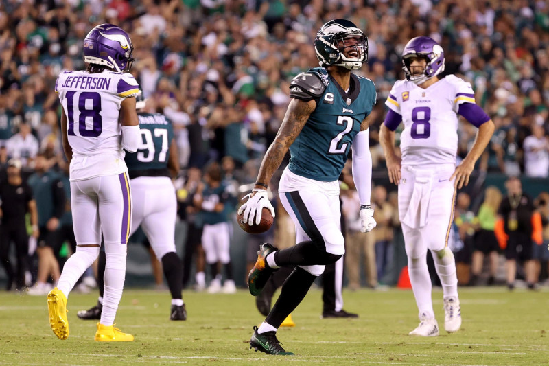 Kirk Cousins of the Minnesota Vikings celebrates on the field