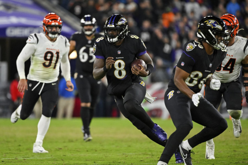 BALTIMORE, MD - OCTOBER 09: Bengals quarterback Joe Burrow (9) looks at the  scoreboard during the Cincinnati Bengals versus Baltimore Ravens NFL game  at M&T Bank Stadium on October 9, 2022 in