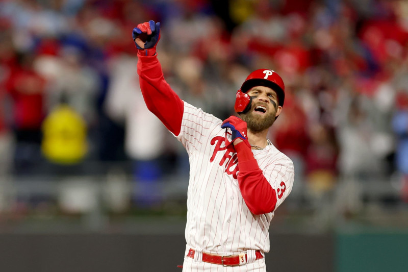 Philadelphia Phillies' Bryce Harper reacts as he scores on Rhys Hoskins'  double in the ninth inning of a baseball game against the Washington  Nationals, Thursday, Aug. 5, 2021, in Washington. Philadelphia won