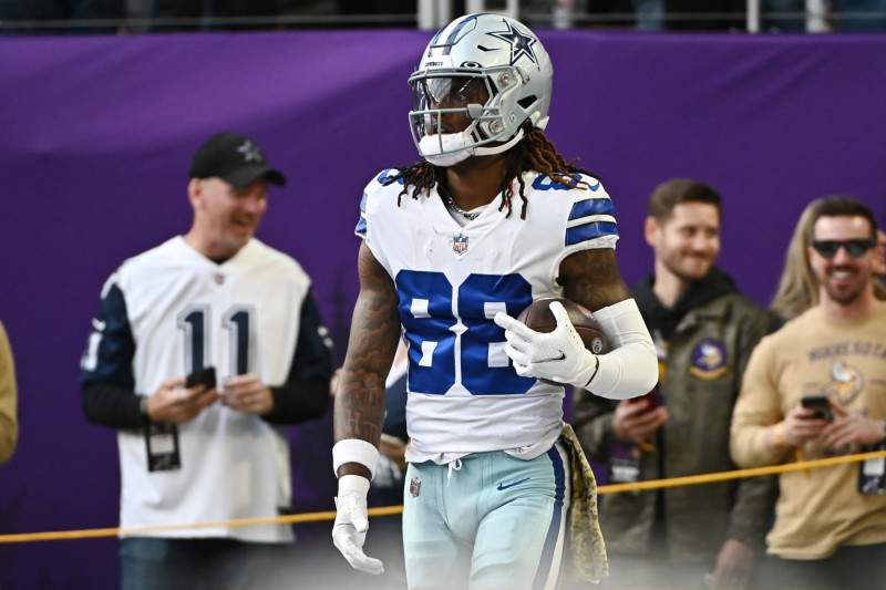 MINNEAPOLIS, MN - NOVEMBER 20: Dallas Cowboys quarterback Dak Prescott (4)  looks to pass during the second quarter of a game between the Minnesota  Vikings and Dallas Cowboys on November 20, 2022