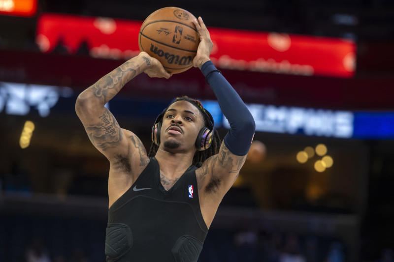 Memphis Grizzlies guard Ja Morant warms up before an NBA basketball game against the Houston Rockets, Wednesday, March 22, 2023, in Memphis, Tenn. (AP Photo/Brandon Dill)