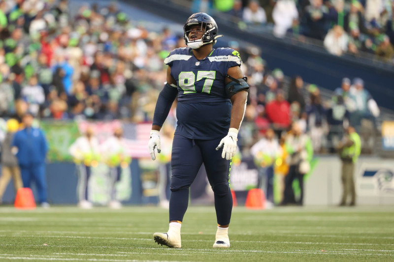SEATTLE, WASHINGTON - NOVEMBER 21: Poona Ford #97 of the Seattle Seahawks reacts against the Arizona Cardinals during the fourth quarter at Lumen Field on November 21, 2021 in Seattle, Washington. (Photo by Abbie Parr/Getty Images)