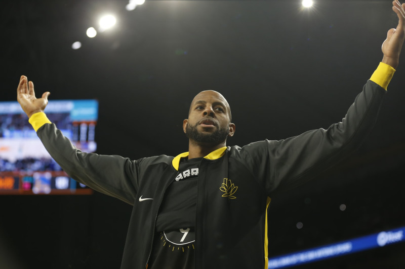 SAN ANTONIO, TX - JANUARY 13: Andre Iguodala #9 of the Golden State Warriors cheers on his team after a basket against the San Antonio Spurs in the second half at Alamodome on January 13, 2023 in San Antonio, Texas. NOTE TO USER: User expressly acknowledges and agrees that, by downloading and or using this photograph, User is consenting to terms and conditions of the Getty Images License Agreement. (Photo by Ronald Cortes/Getty Images)