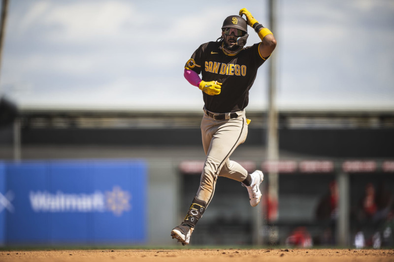 Fernando Tatis Jr. #23 of the San Diego Padres hits a solo home