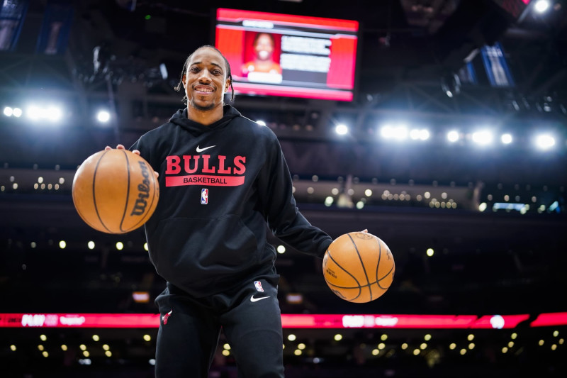 TORONTO, CANADA - APRIL 12: DeMar DeRozan #11 of the Chicago Bulls smiles and warms up before the 2023 Play-In Tournament against the Toronto Raptors on April 12, 2023 at the Scotiabank Arena in Toronto, Ontario, Canada.  NOTE TO USER: User expressly acknowledges and agrees that, by downloading and or using this Photograph, user is consenting to the terms and conditions of the Getty Images License Agreement.  Mandatory Copyright Notice: Copyright 2022 NBAE (Photo by Mark Blinch/NBAE via Getty Images)