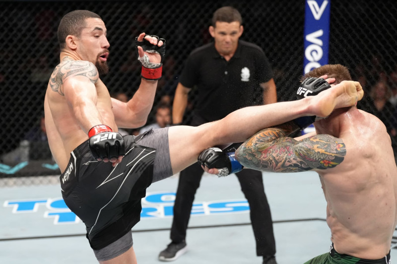 PARIS, FRANCE - SEPTEMBER 03: (L-R) Robert Whittaker of New Zealand kicks Marvin Vettori of Italy in a middleweight fight during the UFC Fight Night event at The Accor Arena on September 03, 2022 in Paris, France. (Photo by Jeff Bottari/Zuffa LLC)