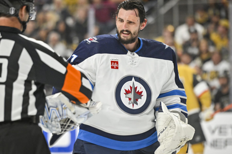 LAS VEGAS, NEVADA - APRIL 20: Connor Hellebuyck #37 of the Winnipeg Jets reacts after suffering a cut on a shot by Jack Eichel #9 of the Vegas Golden Knights during the first period in Game Two of the First Round of the 2023 Stanley Cup Playoffs at T-Mobile Arena on April 20, 2023 in Las Vegas, Nevada. (Photo by David Becker/NHLI via Getty Images)