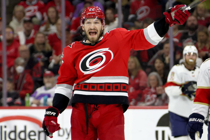 RALEIGH, NORTH CAROLINA - MAY 18: Brett Pesce #22 of the Carolina Hurricanes argues for penalty against the Florida Panthers during the first period in Game One of the Eastern Conference Final of the 2023 Stanley Cup Playoffs at PNC Arena on May 18, 2023 in Raleigh, North Carolina. (Photo by Bruce Bennett/Getty Images)