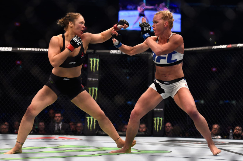 MELBOURNE, AUSTRALIA - NOVEMBER 15:  (L-R) Ronda Rousey faces Holly Holm in their UFC women's bantamweight championship bout during the UFC 193 event at Etihad Stadium on November 15, 2015 in Melbourne, Australia. (Photo by Jeff Bottari/Zuffa LLC/Zuffa LLC via Getty Images)