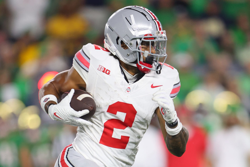 SOUTH BEND, INDIANA - SEPTEMBER 23: Emeka Egbuka #2 of the Ohio State Buckeyes runs with the ball against the Notre Dame Fighting Irish during the first half at Notre Dame Stadium on September 23, 2023 in South Bend, Indiana. (Photo by Michael Reaves/Getty Images)