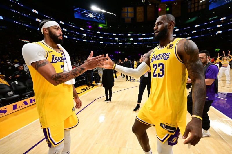 LOS ANGELES, CA - OCTOBER 30: Anthony Davis #3 and LeBron James #23 of the Los Angeles Lakers high five after the game against the Orlando Magic on October 30, 2023 at Crypto.Com Arena in Los Angeles, California. NOTE TO USER: User expressly acknowledges and agrees that, by downloading and/or using this Photograph, user is consenting to the terms and conditions of the Getty Images License Agreement. Mandatory Copyright Notice: Copyright 2023 NBAE (Photo by Adam Pantozzi/NBAE via Getty Images)