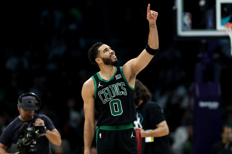 CHARLOTTE, NORTH CAROLINA - NOVEMBER 20: Jayson Tatum #0 of the Boston Celtics reacts to a call during the second half of an NBA game against the Charlotte Hornets at Spectrum Center on November 20, 2023 in Charlotte, North Carolina. NOTE TO USER: User expressly acknowledges and agrees that, by downloading and or using this photograph, User is consenting to the terms and conditions of the Getty Images License Agreement. (Photo by David Jensen/Getty Images)