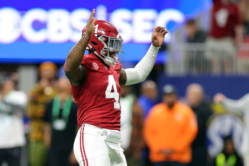 ATLANTA, GEORGIA - DECEMBER 02: Jalen Milroe #4 of the Alabama Crimson Tide celebrates a touchdown during the fourth quarter against the Georgia Bulldogs in the SEC Championship at Mercedes-Benz Stadium on December 02, 2023 in Atlanta, Georgia. (Photo by Kevin C. Cox/Getty Images)