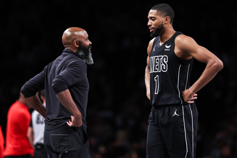 NEW YORK, NEW YORK - JANUARY 07: Mikal Bridges #1 of the Brooklyn Nets speaks with Jacque Vaughn head coach of the Brooklyn Nets during the third quarter of the game against the Portland Trail Blazers at Barclays Center on January 07, 2024 in New York City. NOTE TO USER: User expressly acknowledges and agrees that, by downloading and or using this photograph, User is consenting to the terms and conditions of the Getty Images License Agreement. (Photo by Dustin Satloff/Getty Images)