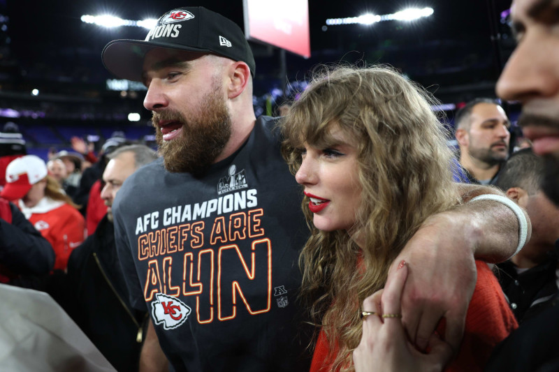 BALTIMORE, MARYLAND - JANUARY 28: Travis Kelce #87 of the Kansas City Chiefs celebrates with Taylor Swift after a 17-10 victory against the Baltimore Ravens in the AFC Championship Game at M&T Bank Stadium on January 28, 2024 in Baltimore, Maryland. (Photo by Patrick Smith/Getty Images)