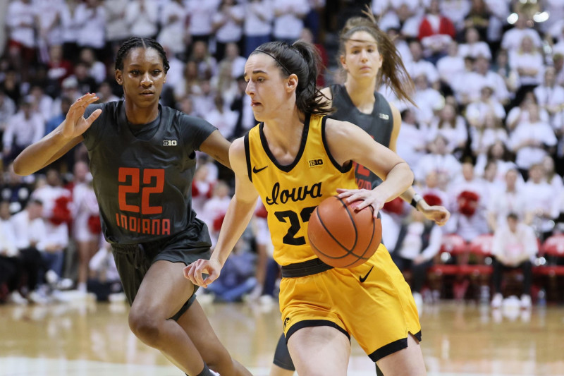 BLOOMINGTON, INDIANA - FEBRUARY 22: Caitlin Clark #22 of the Iowa Hawkeyes dribbles the ball in the first half against the Indiana Hoosiers at Simon Skjodt Assembly Hall on February 22, 2024 in Bloomington, Indiana. (Photo by Andy Lyons/Getty Images)