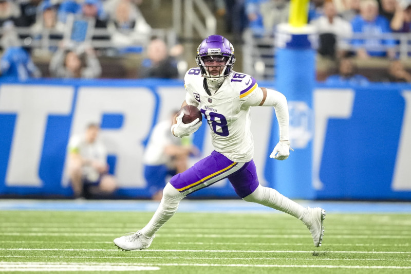 DETROIT, MICHIGAN - JANUARY 07: Justin Jefferson #18 of the Minnesota Vikings runs the ball against the Detroit Lions at Ford Field on January 07, 2024 in Detroit, Michigan. (Photo by Nic Antaya/Getty Images)