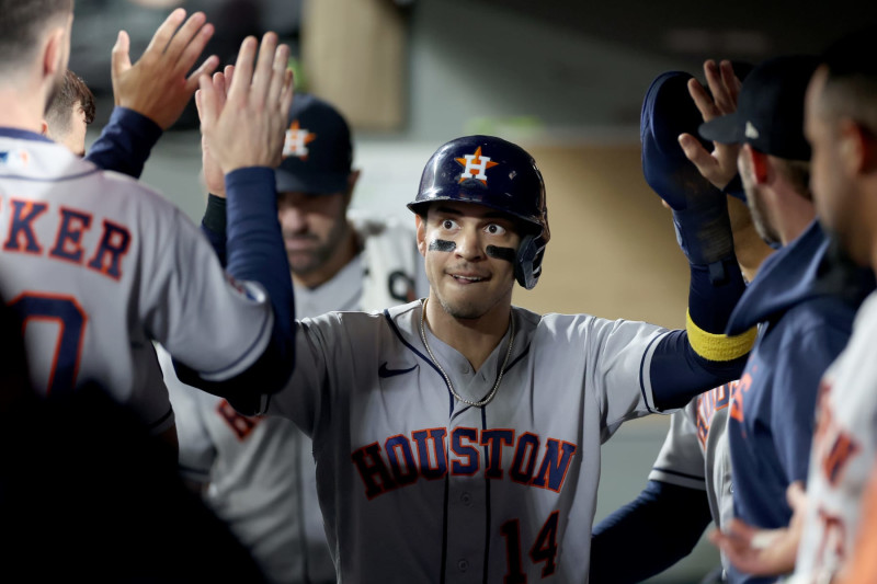 SEATTLE, WASHINGTON - SEPTEMBER 25: Houston Astros second baseman Mauricio Dubon #14 celebrates a run during the second inning against the Seattle Mariners at T-Mobile Park on September 25, 2023 in Seattle, Washington. (Photo by Steph Chambers/Getty Images)