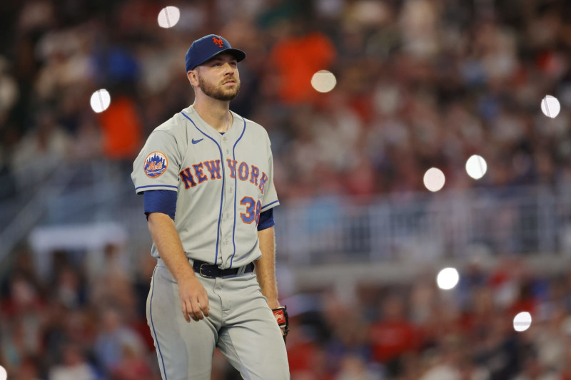 ATLANTA, GEORGIA - AUGUST 22:  Pitcher Tylor Megill #38 of the New York Mets leaves the game in the fifth inning against the Atlanta Braves at Truist Park on August 22, 2023 in Atlanta, Georgia. (Photo by Alex Slitz/Getty Images)