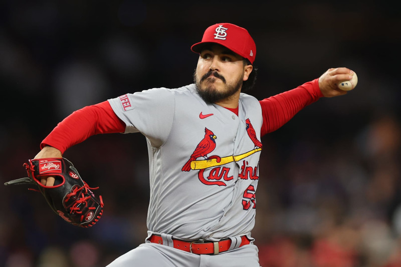 CHICAGO, ILLINOIS - JULY 20: JoJo Romero #59 of the St. Louis Cardinals delivers a pitch during the eighth inning against the Chicago Cubs at Wrigley Field on July 20, 2023 in Chicago, Illinois. (Photo by Michael Reaves/Getty Images)