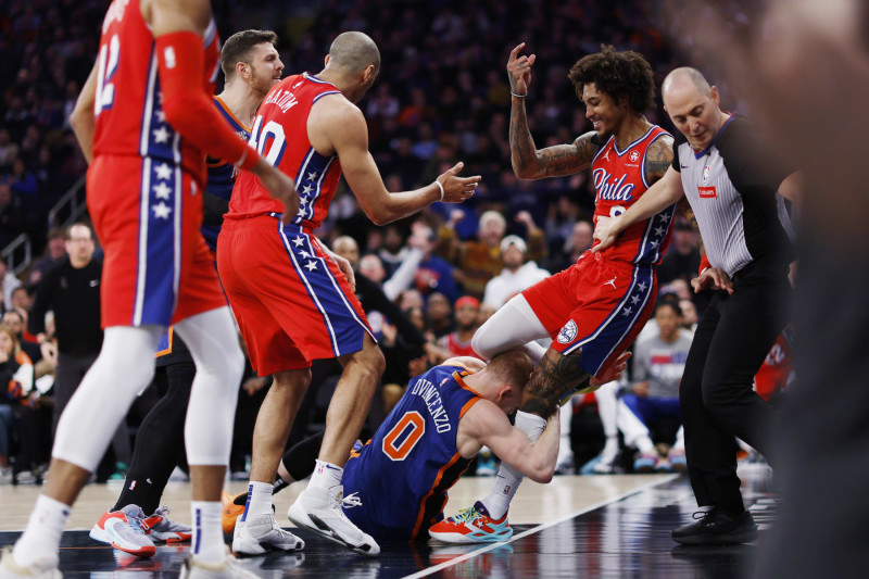 NEW YORK, NEW YORK - MARCH 10: Donte DiVincenzo #0 of the New York Knicks grabs Kelly Oubre Jr. #9 of the Philadelphia 76ers starting an altercation during the second half at Madison Square Garden on March 10, 2024 in New York City. The 76ers won 79-73. NOTE TO USER: User expressly acknowledges and agrees that, by downloading and or using this photograph, User is consenting to the terms and conditions of the Getty Images License Agreement. (Photo by Sarah Stier/Getty Images)