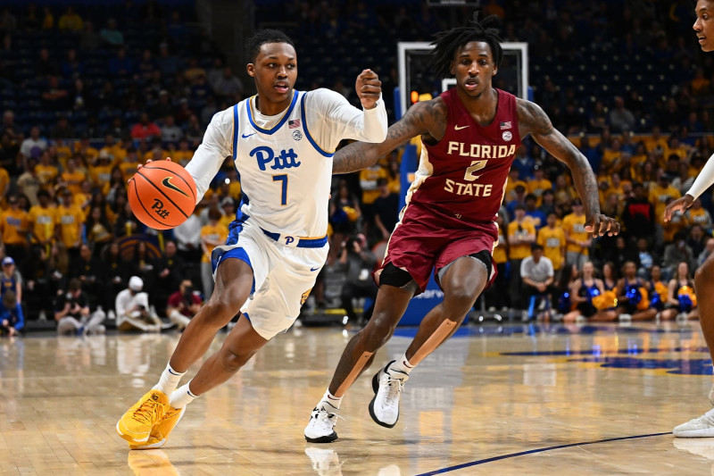 PITTSBURGH, PENNSYLVANIA - MARCH 5: Carlton Carrington #7 of the Pittsburgh Panthers dribbles against Jamir Watkins #2 of the Florida State Seminoles in the first half during the game at Petersen Events Center on March 5, 2024 in Pittsburgh, Pennsylvania. (Photo by Justin Berl/Getty Images)