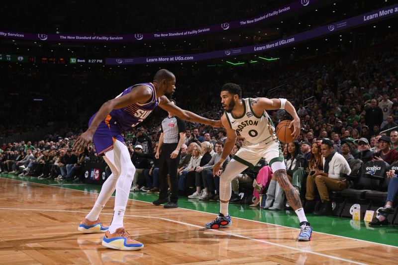 BOSTON, MA - MARCH 14: Jayson Tatum #0 of the Boston Celtics dribbles the ball during the game against the Phoenix Suns on March 14, 2024 at the TD Garden in Boston, Massachusetts. NOTE TO USER: User expressly acknowledges and agrees that, by downloading and or using this photograph, User is consenting to the terms and conditions of the Getty Images License Agreement. Mandatory Copyright Notice: Copyright 2024 NBAE  (Photo by Brian Babineau/NBAE via Getty Images)