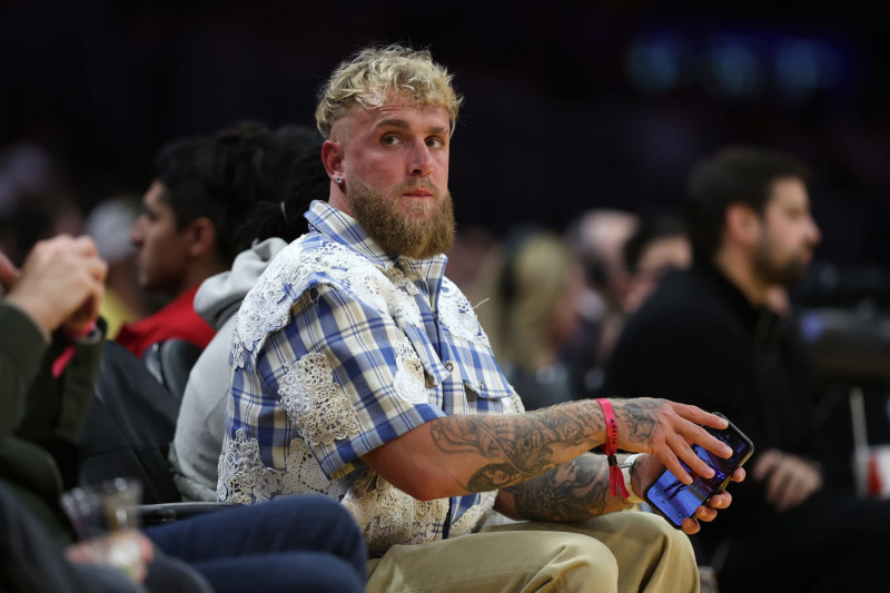 LOS ANGELES, CALIFORNIA - MARCH 08: Boxer Jake Paul looks on during the first half of a game between the Los Angeles Lakers and the Milwaukee Bucks at Crypto.com Arena on March 08, 2024 in Los Angeles, California. (Photo by Sean M. Haffey/Getty Images)