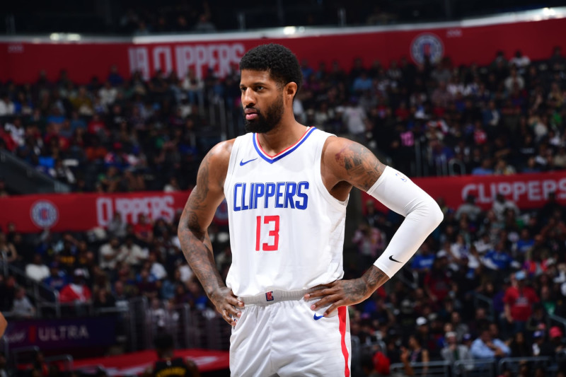 LOS ANGELES, CA - MARCH 17: Paul George #13 of the LA Clippers looks on during the game against the Atlanta Hawks on March 17, 2024 at Crypto.Com Arena in Los Angeles, California. NOTE TO USER: User expressly acknowledges and agrees that, by downloading and/or using this Photograph, user is consenting to the terms and conditions of the Getty Images License Agreement. Mandatory Copyright Notice: Copyright 2024 NBAE (Photo by Adam Pantozzi/NBAE via Getty Images)