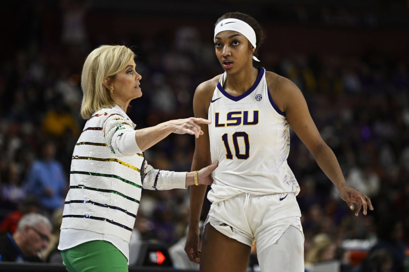 GREENVILLE, SOUTH CAROLINA - MARCH 09: Head coach Kim Mulkey of the LSU Lady Tigers talks with Angel Reese #10 against the Ole Miss Rebels in the fourth quarter during the semifinals of the SEC Women's Basketball Tournament at Bon Secours Wellness Arena on March 09, 2024 in Greenville, South Carolina. (Photo by Eakin Howard/Getty Images)