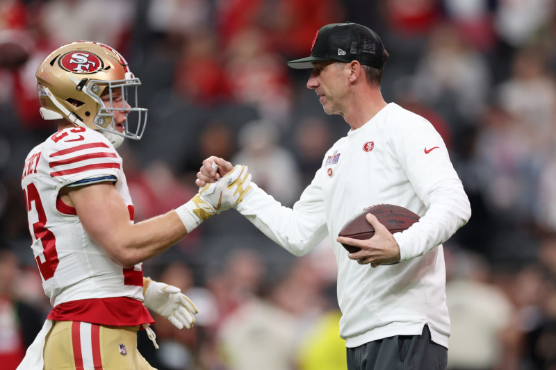 LAS VEGAS, NEVADA - FEBRUARY 11: Head coach Kyle Shanahan of the San Francisco 49ers interacts with Christian McCaffrey #23 prior to Super Bowl LVIII against the Kansas City Chiefs at Allegiant Stadium on February 11, 2024 in Las Vegas, Nevada. (Photo by Ezra Shaw/Getty Images)
