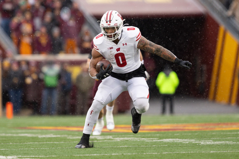 MINNEAPOLIS, MN - NOVEMBER 25: Wisconsin Badgers running back Braelon Allen (0) runs with the ball during the college football game between the Wisconsin Badgers and the Minnesota Golden Gophers on November 25th, 2023, at Huntington Bank Stadium in Minneapolis, MN. (Photo by Bailey Hillesheim/Icon Sportswire via Getty Images)