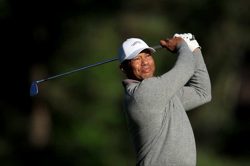 AUGUSTA, GEORGIA - APRIL 12: Tiger Woods of The United States plays his second shot on the 17th hole during the completion of the weather delayed first round of the 2024 Masters Tournament at Augusta National Golf Club on April 12, 2024 in Augusta, Georgia. (Photo by David Cannon/Getty Images)