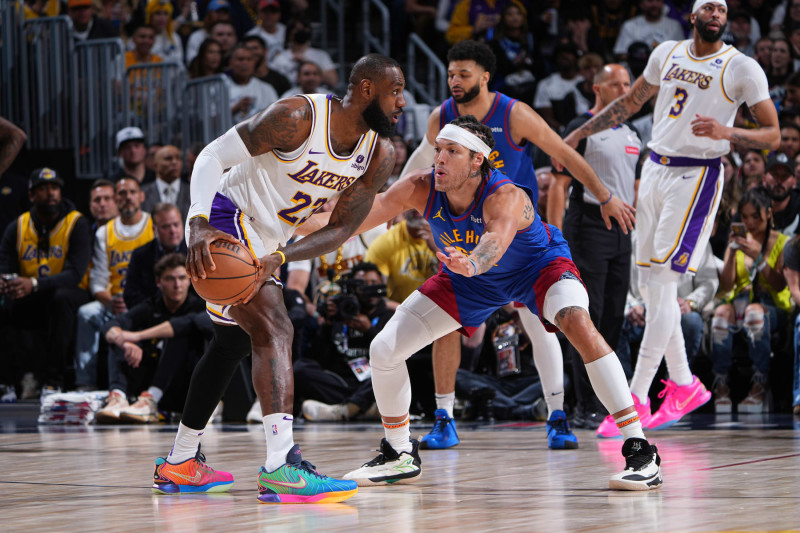 DENVER, CO - APRIL 20: LeBron James #23 of the Los Angeles Lakers dribbles the ball during the game against the Denver Nuggets during Round 1 Game 1 of the 2024 NBA Playoffs on April 20, 2024 at the Ball Arena in Denver, Colorado. NOTE TO USER: User expressly acknowledges and agrees that, by downloading and/or using this Photograph, user is consenting to the terms and conditions of the Getty Images License Agreement. Mandatory Copyright Notice: Copyright 2024 NBAE (Photo by Garrett Ellwood/NBAE via Getty Images)