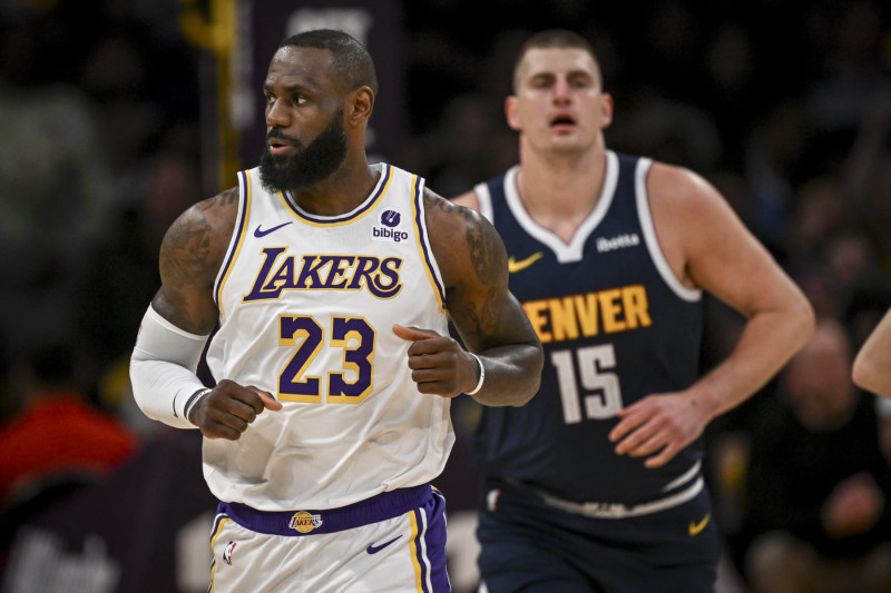 LOS ANGELES, CA - APRIL 27: Nikola Jokic (15) of the Denver Nuggets and LeBron James (23) of the Los Angeles Lakers square off during the first half at Crypto.com Arena in Los Angeles on Saturday, April 27, 2024. (Photo by AAron Ontiveroz/The Denver Post)