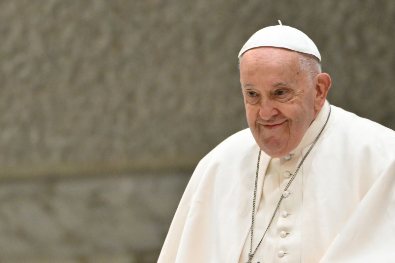 Pope Francis smiles during an audience to Members of the National Confederation of Professional Education and Training (CONFAP) on May 03, 2024 at Paul-VI hall in The Vatican. (Photo by Alberto PIZZOLI / AFP) (Photo by ALBERTO PIZZOLI/AFP via Getty Images)